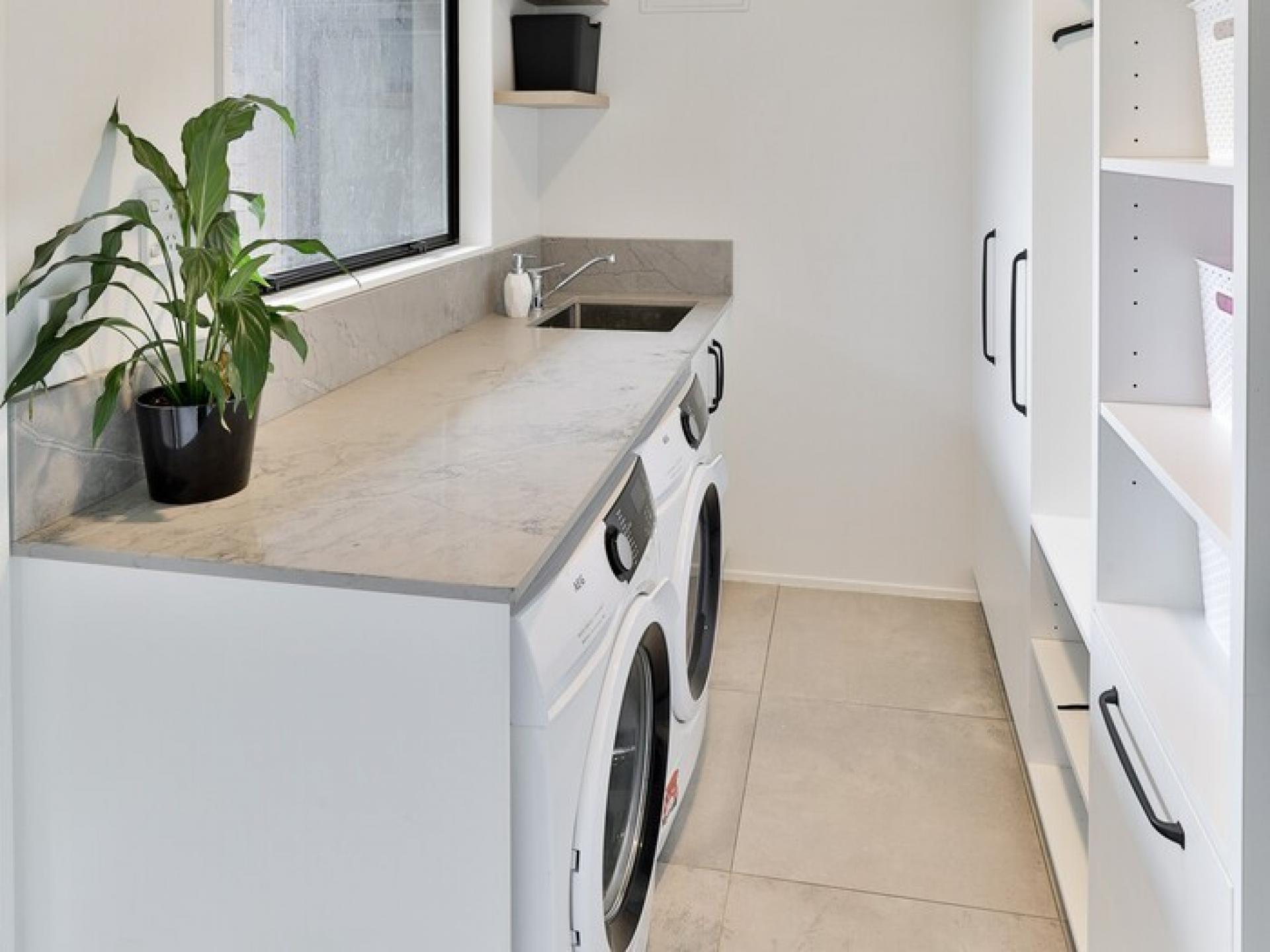 Laundry Project by Cutting Edge Cabinetry